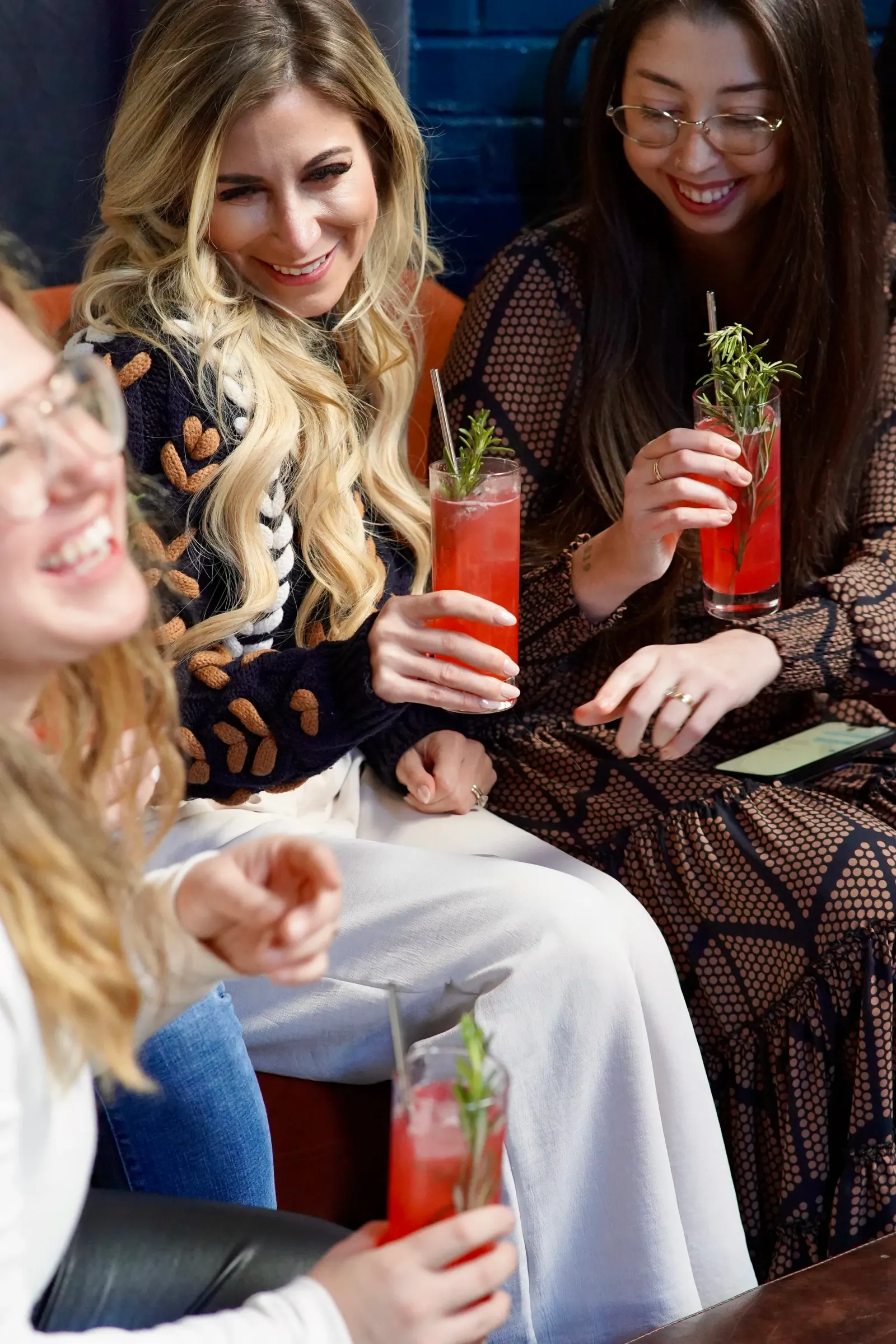 Guests enjoying cocktails together at Elsewhere